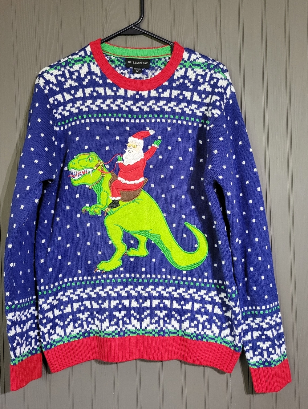 Blizzard Bay Ugly Christmas Sweater "Santa Riding T-Rex" Blue Red Men’s Medium